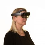 Photo of a woman wearing an augmented reality headset